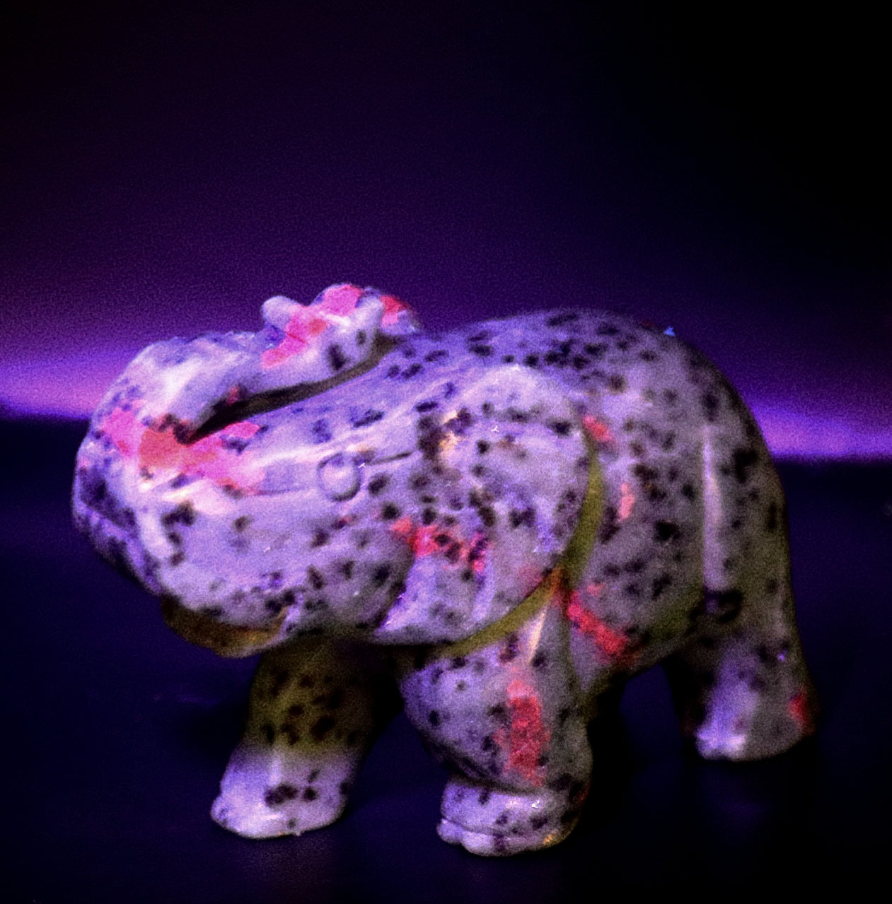 Ruby Kyanite Curved Gemstone Elephant With UV light Reaction