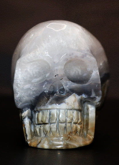 Volcanic Agate Gemstone Curved Skull With UV Reaction